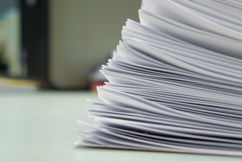 stack of paper invoices